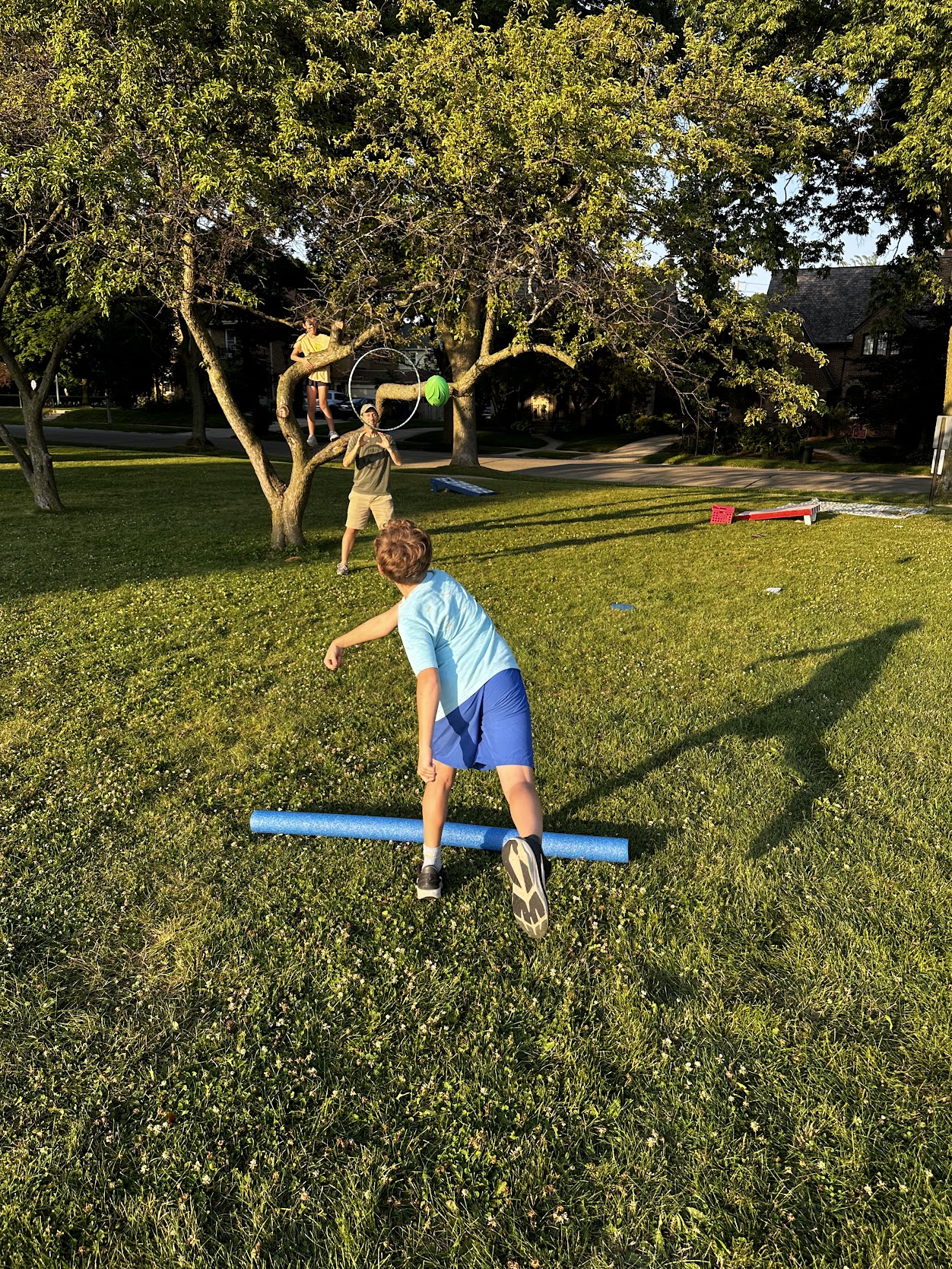 Kids playing games on the green space of Armory Park in Whitefish Bay
